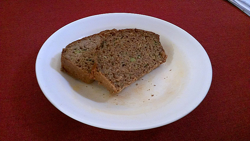 2 slices of zucchini bread on a white plate